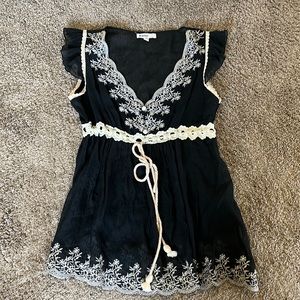 Black and ivory sheer tank w/ruffle sleeve and embroidery detail